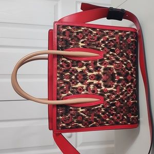 Christian Louboutin black and tan handbag.